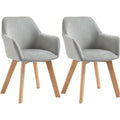 Deux chaises repas en velours gris avec assise rembourree, design elegant pour decoration interieure moderne