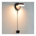 Luminaire Noir et Rouge a silhouette graphique de type applique murale