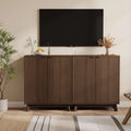 Console finition noyer avec facade cannelee, portes et tablettes ajustables, meuble elegant pour cuisine ou espace de vie